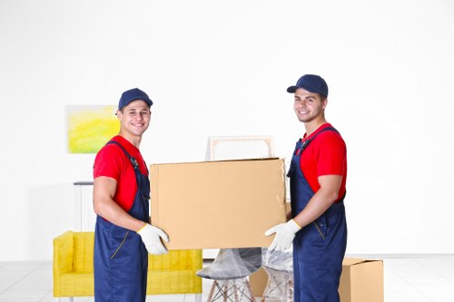 Customer handling boxes carefully in a storage facility